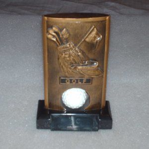 Golf trophy with spinning golf ball and place for nametag